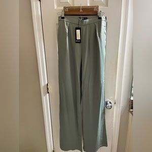New with tags sage green silky pants size 6/ UK 10
